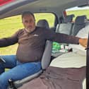 Michael Harrison in the car he calls home.