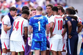 Thomas Tuchel, Manager of England, speaks with his players during the International Friendly match between England and Costa Rica 