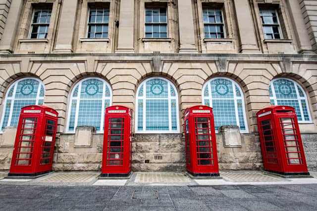 The old Post Office building has had 'fake windows' fitted by Links signs and graphics.