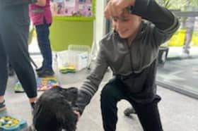 Dominic with therapy dog Lilo