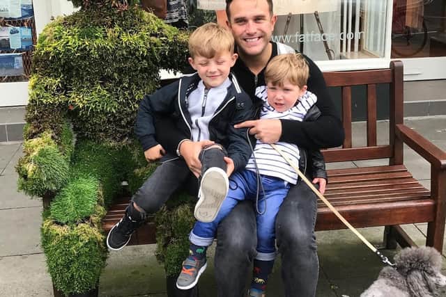 Nigel Marlow with his sons