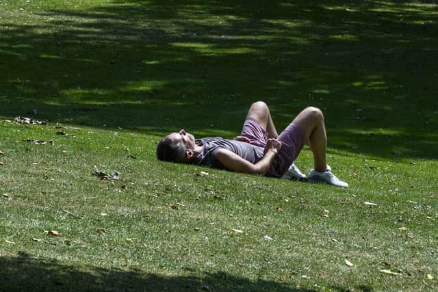 One person soaks up all the sun he can during the UK heatwave.