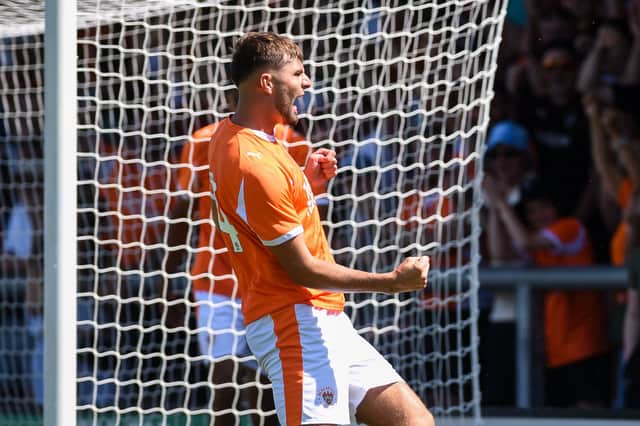 Tom Bloxham scored for Blackpool at AFC Fylde last summer