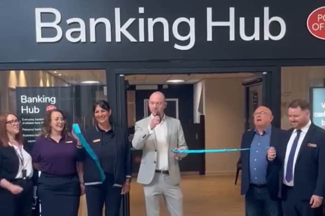 Fylde MP Andrew Snowden cuts the ribbon to open the Poulton banking hub