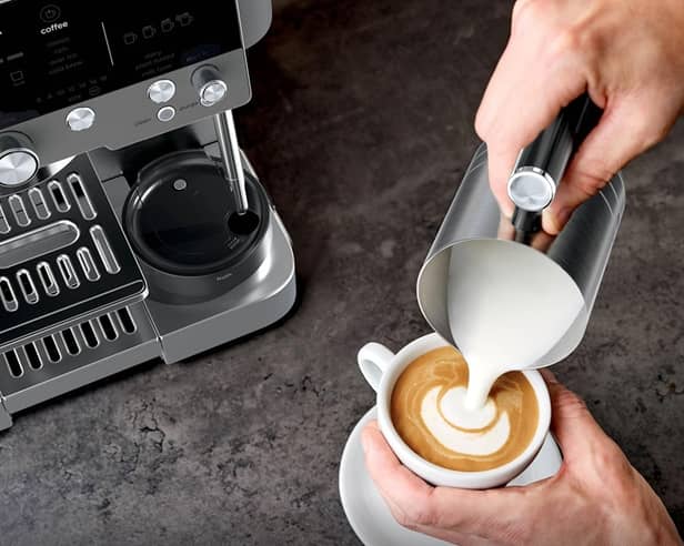 The Ninja Luxe Café Premier Espresso Machine in grey is designed to make espresso, cappuccinos and lattes with automated brewing features.