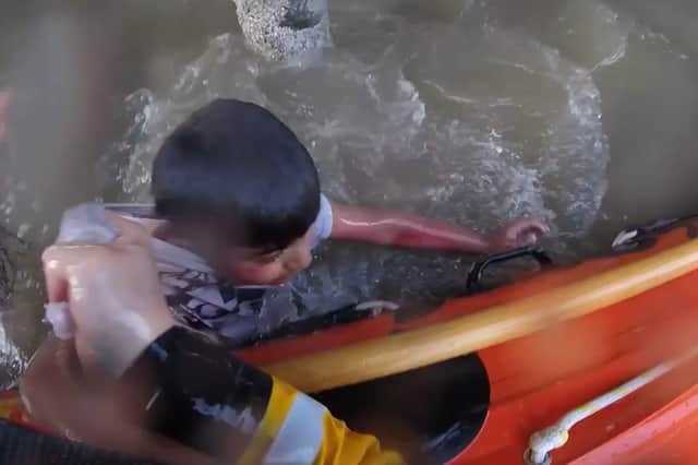 A mother has recalled the moment she feared her 10-year-old son had drowned after watching his head disappear beneath the waves during a terrifying incident off the coast of Blackpool.