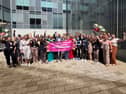 Staff and senior leader from children’s services celebrate their Ofsted rating with cabinet members Cllr Kath Benson, Cllr Lynn Williams, and Cllr Jim Hobson