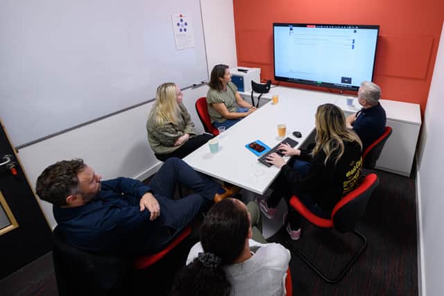Business executives work in team’s during Hydra’s simulation training. Photo: Kelvin Lister-Stuttard
