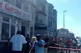 Chaotic scenes outside the former Lyndhurst Hotel, now Rose Garden Hotel on Station Road