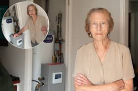 Joan Adams says the two boilers  are badly fitted and do not work, while  the walls and ceilings were damaged during the installation. Photo: Lucinda Herbert