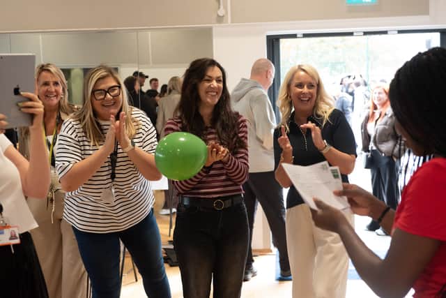 Staff cheer as Jane Idiasirue reveals her GCSE results at South Shore Academy