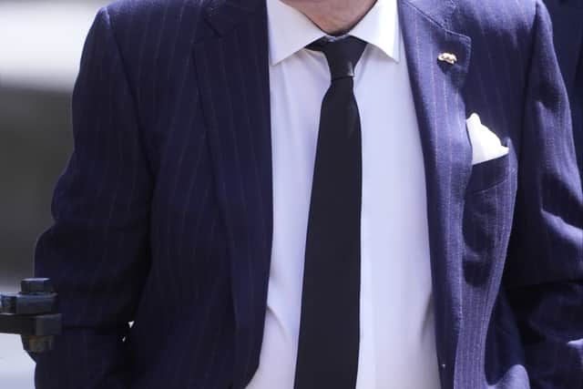 Roy Walker arrives for the funeral of stand-up comedian Jimmy Cricket.