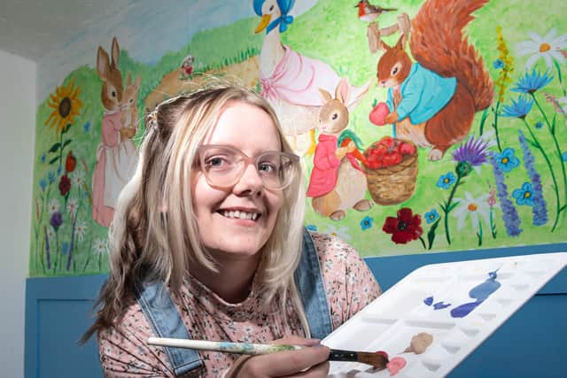 Natalie Percival aka Nat Paints Little Worlds with her Peter Rabbit inspired wall mural painted in a children's nursery room. Photo: Lucinda Herbert