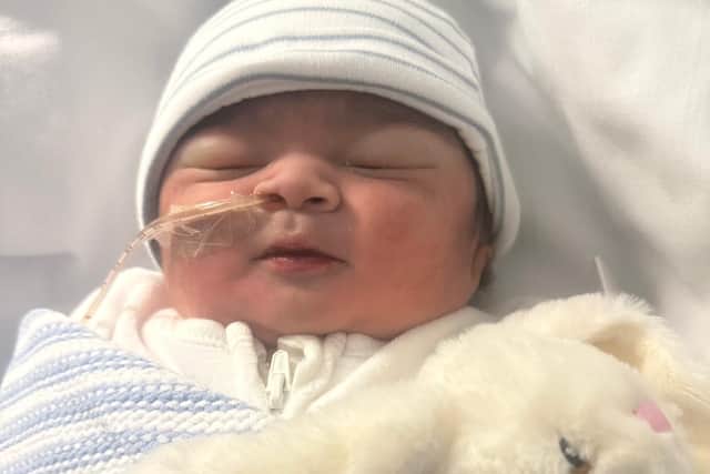 Richard George died at eight days old