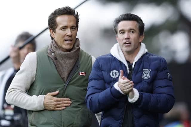Wrexham co-owners Ryan Reynolds (left) and Rob Mac on the sidelines at the Racecourse Ground.