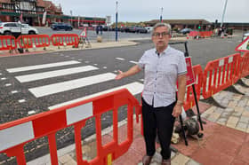 John Miller at the crossing concerning him on St Annes Promenade