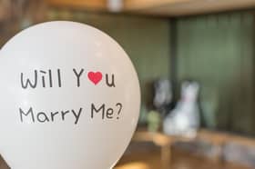 A benefit cheat who falsely claimed more than £70,000 by saying he was single - was caught out by a Facebook post which showed him proposing to his partner.