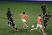Albie Morgan fires home his and Blackpool's second goal against Crewe
