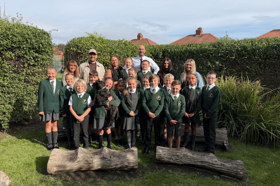 Shakespeare has been awarded a prestigious award. Names of adults (left to right): Mrs Mather, Elliot, Miss Mooney, Mr Twist, Heather, Mrs Slater