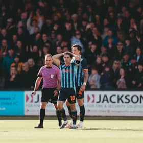 Blackpool's George Honeyman reacts after being sent off at Cambridge United