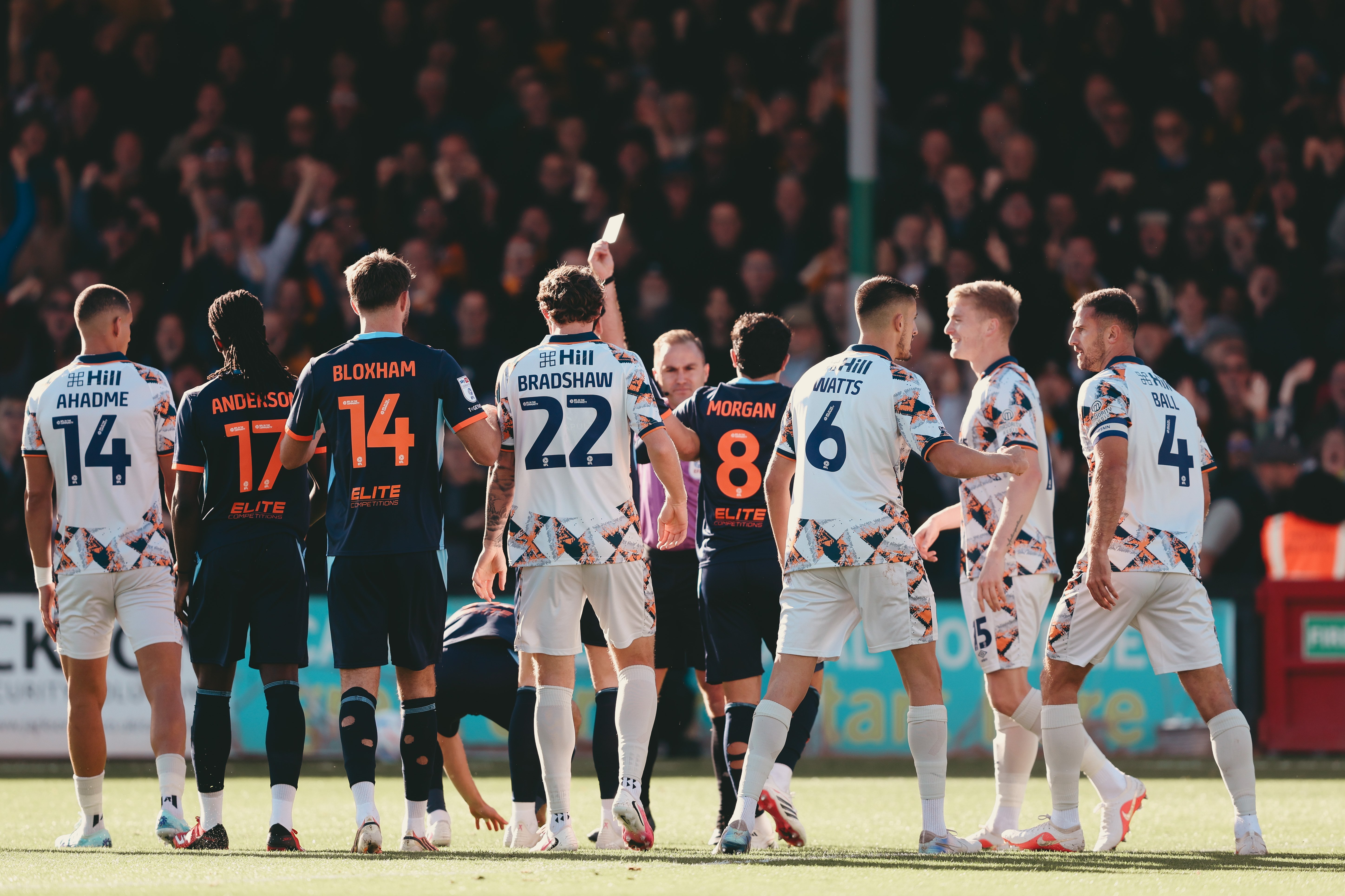 Blackpool midfielder will be available this weekend after Cambridge United red card is overturned
