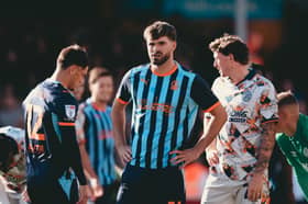 Jerry Yates (left) and Tom Bloxham started up front for Blackpool at Cambridge United last weekend
