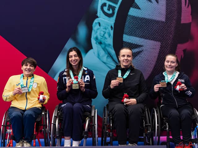 Justine Moore (right) is dreaming of a place at the 2028 LA Paralympics
