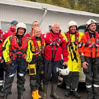 Fylde coast RNLI crew member at Finnish Lifeboat Institution alongside crew from all over Europe