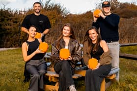 The Elite team with some of the pumpkins ready for the give away
