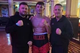Victorious Joseph Walker with coach Josh O'Gara (left) and manager Glenn Banks at the Winter Gardens