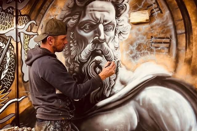 Artist Adam Salisbury at work