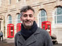 Stuart Wignall in front of the former Post Office building in Blackpool