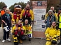 RNLI crew members and supporters ready to collect