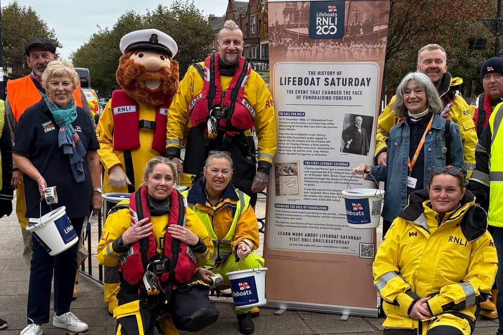 RNLI crew members and supporters ready to collect