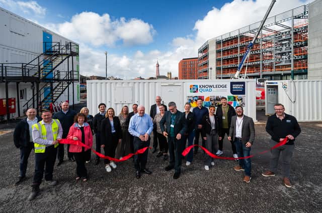Cllr Mark Smith, Cabinet Member for Economy and Built Environment at Blackpool Council; Alun Francis, Chief Executive of Blackpool and The Fylde College (holding the scissors) with members of the wider project team.