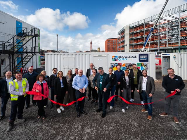 Cllr Mark Smith, Cabinet Member for Economy and Built Environment at Blackpool Council; Alun Francis, Chief Executive of Blackpool and The Fylde College (holding the scissors) with members of the wider project team.