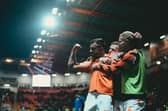 Dale Taylor celebrates his goal in Blackpool's victory over MK Dons