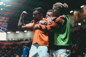 Dale Taylor celebrates his goal in Blackpool's victory over MK Dons