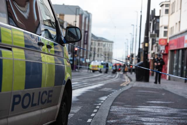 Police cordon off Talbot Road in Blackpool. Photo: Lucinda Herbert