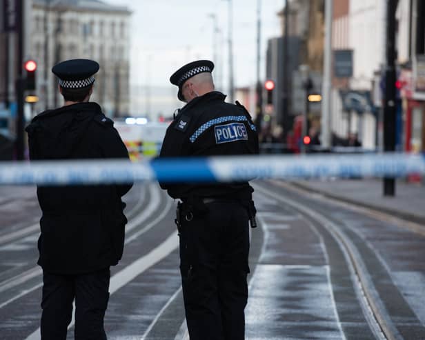 Police cordon off Talbot Road in Blackpool. Photo: Lucinda Herbert