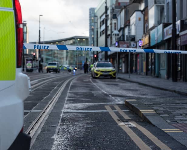 Police cordon off Talbot Road in Blackpool. Photo: Lucinda Herbert
