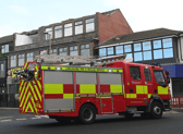 The fire brigade are on scene at the New Philly after its roof was blown off. 