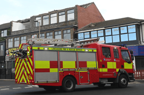 The fire brigade are on scene at the New Philly after its roof was blown off. 