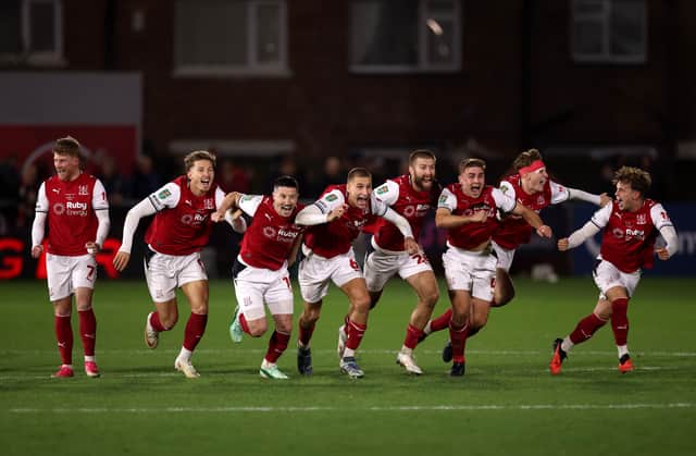 Fleetwood Town celebrate after penalty shoot-out win over Arsenal at Highbury