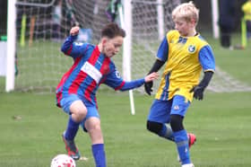 TM Sports Under-11s on the ball against Spirit of Youth Neos