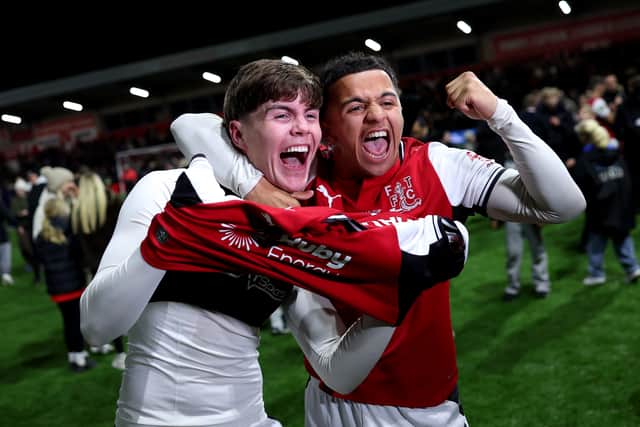Penalty king Conor Haughey and Raffaele Cirino celebrate Fleetwood Town's cup upset over Arsenal at Highbury Stadium.