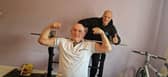 Former strongman Harry Kay who is still training at 80 with his neighbour Arron Hearsum. Picture: Lucinda Herbert