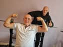 Former strongman Harry Kay who is still training at 80 with his neighbour Arron Hearsum. Picture: Lucinda Herbert