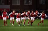 Former Pompey midfielder Andy Cannon and his Fleetwood team-mates celebrate victory over Arsenal. Pic: Getty