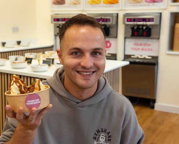 Luke Bowen-Price demonstrates one of the build-you-own dessert options at BAD Desserts on Lytham Road, Blackpool  Photo: Lucinda Herbert